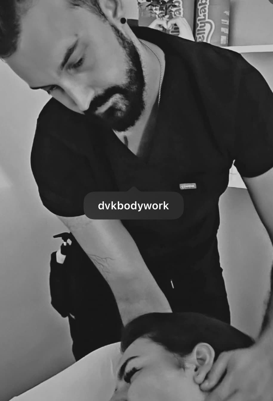 Danny of DVK Bodyworks Studio giving a massage treatment at The Nightingale Wellness Clinic