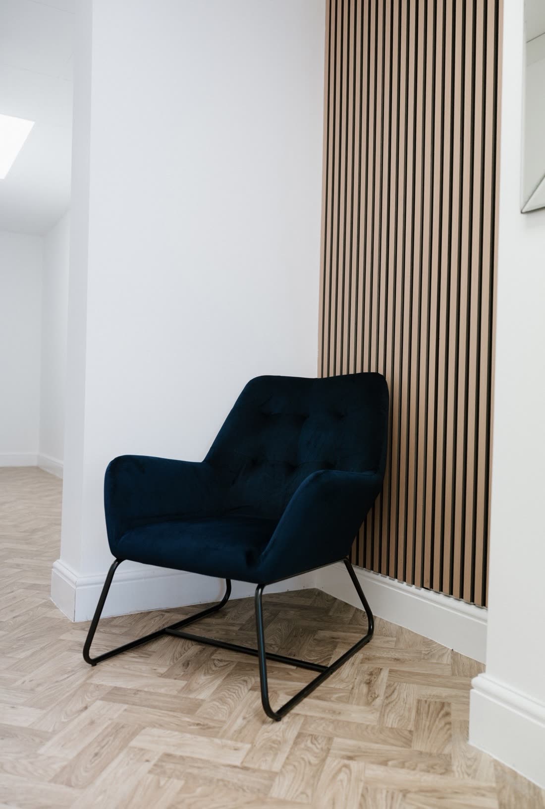A welcoming armchair in The Nightingale Wellness Clinic reception